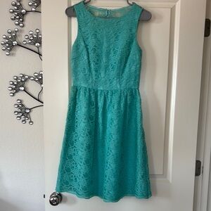 Calvin Klein Size 2 Turquoise‎ Lace Mini Dress with Cut-Out Back.